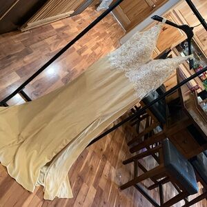 Wedding dress purchased from JJHouse.  New with tags